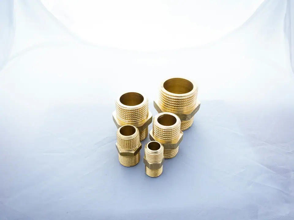 Group of brass hex nipples and reducers