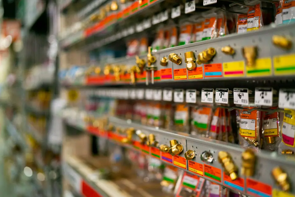 Shelves stocked with brass and pneumatic fittings